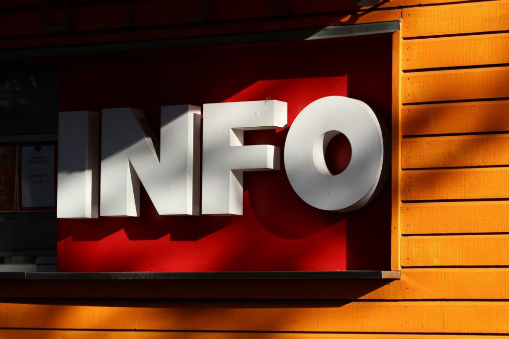 Le mot INFO écrit en blanc sur fond rouge illustrant définition ECM - Enterprise Content Management